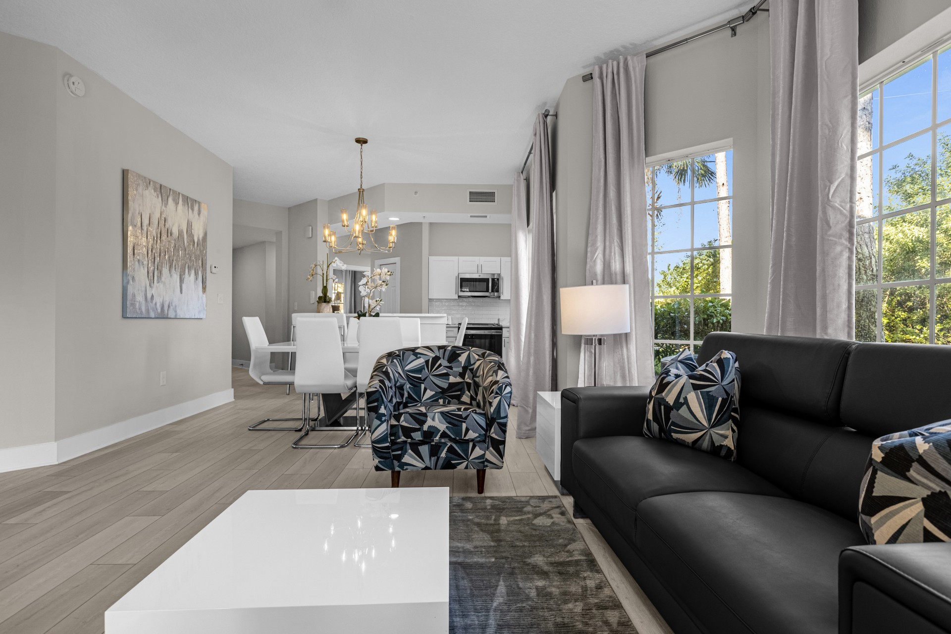 Open-plan living and dining area in a WorldQuest Orlando Resort suite